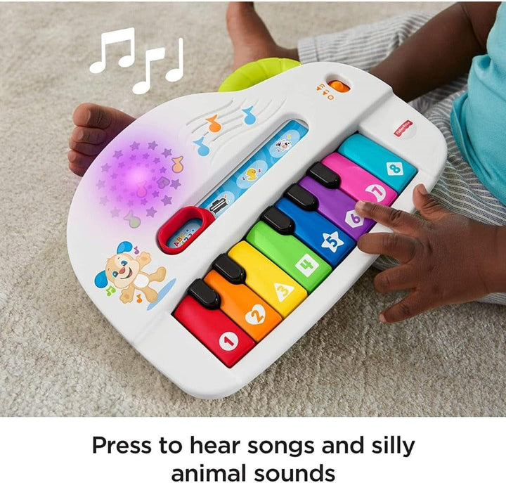 Fisher-Price Baby's first keyboard - pian portabil de jucărie cu 4 opțiuni de redare, cântece, lumini și sunete, învățare jucăușă, versiune: UK-English , GFK04 Jucarii Bebe Naty Shop